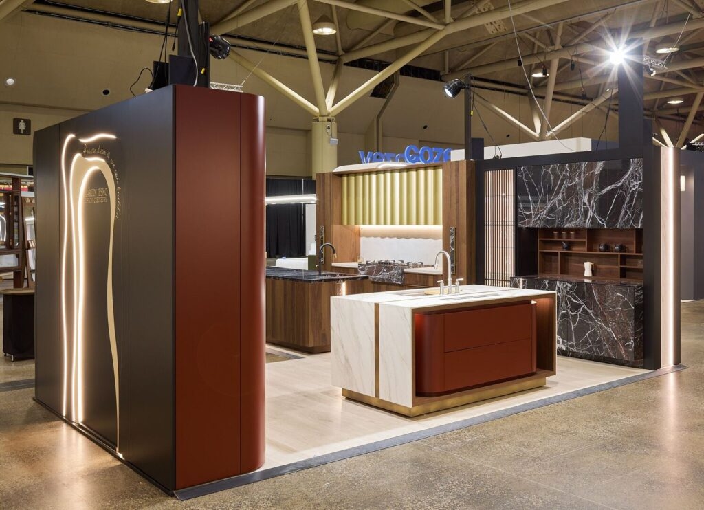 Staged MJCC IDS Toronto 2026 booth featuring custom cabinetry